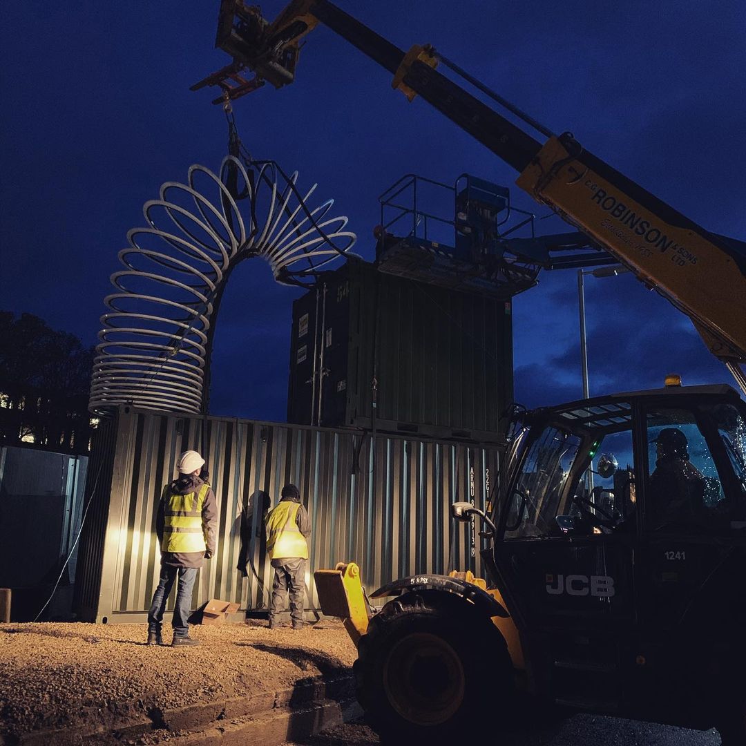 End Over End - Giant Slinky Light sculpture installing